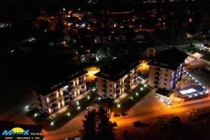 an aerial view of a city at night at Monix Palace Zlatibor in Zlatibor
