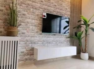 TV a/nebo společenská místnost v ubytování Superbe Appartement kantaoui sousse
