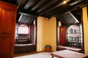 Newa Chen Historic House UNESCO客房内的一张或多张床位
