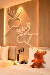 Letto o letti in una camera di Moose Hotel Nimman