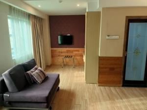 TV a/nebo společenská místnost v ubytování Hotel Balik Pulau