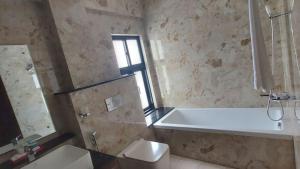 Een badkamer bij Hotel Grand View