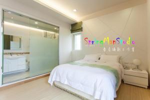 Voodi või voodid majutusasutuse Zhuyuan Ju B&B toas