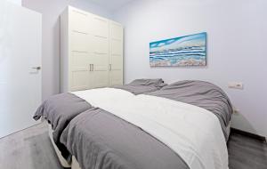 Postel nebo postele na pokoji v ubytování Beach Apartment Montemarcarihuela + 23 fotografií