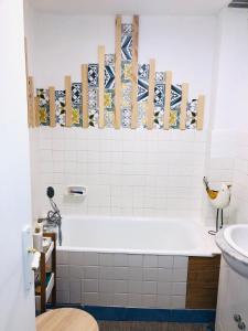 Kúpeľňa v ubytovaní Appartement cosy en ville haute + 6 fotografií