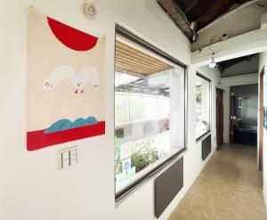 Fotografie z fotogalerie ubytování Jiufen Breeze 九份惠風民宿ｌ6人包棟小屋 v destinaci Ťiou-fen