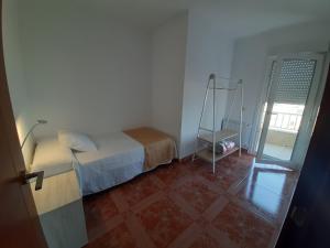 Postel nebo postele na pokoji v ubytování Apartamentos Costas de Bueu B
