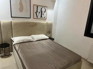 Postel nebo postele na pokoji v ubytování Superbe Appartement kantaoui sousse