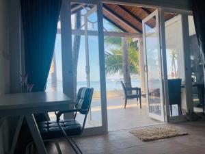 Fotografie z fotogalerie ubytování Bann Kanchana Beachfront Villas v destinaci Bangrak pláž