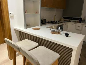 Kuchyň nebo kuchyňský kout v ubytování Superbe Appartement kantaoui sousse