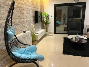 TV a/nebo společenská místnost v ubytování Superbe Appartement kantaoui sousse