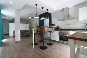 Kuchyň nebo kuchyňský kout v ubytování Carthago Suites
