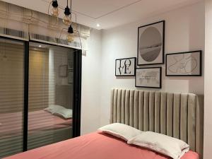 Postel nebo postele na pokoji v ubytování Superbe Appartement kantaoui sousse