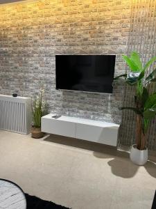 TV a/nebo společenská místnost v ubytování Superbe Appartement kantaoui sousse
