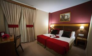 Posteľ alebo postele v izbe v ubytovaní Hotel Regio 2