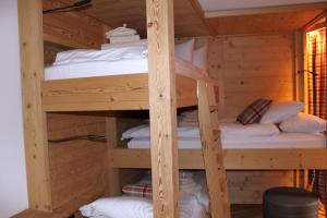 Postel nebo postele na pokoji v ubytování Chalet Binna