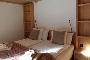 Postel nebo postele na pokoji v ubytování Chalet Binna