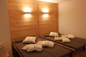 Postel nebo postele na pokoji v ubytování Chalet Binna