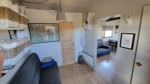 Posezení v ubytování Hekla Nordicabin - Wild Cottage + 12 fotografií
