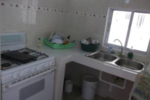 Η κουζίνα ή μικρή κουζίνα στο Lucy Rooms