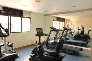 a gym with several cardio machines in a room at Flat Borges Lagoa Ibirapuera c/ garagem UH407 in Sao Paulo