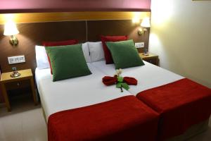 Posteľ alebo postele v izbe v ubytovaní Hotel Regio 2