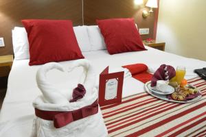 Posteľ alebo postele v izbe v ubytovaní Hotel Regio 2