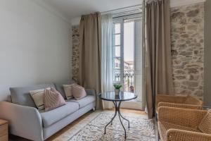 Гостиная зона в Habitaciones Apartamento B&B Plaza Nueva 8
