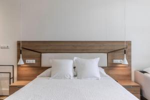 Кровать или кровати в номере Habitaciones Apartamento B&B Plaza Nueva 8