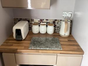 Kuchyň nebo kuchyňský kout v ubytování The Anfield Apartment