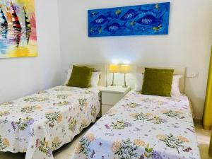 Posteľ alebo postele v izbe v ubytovaní Beach Bungalow Holiday Home