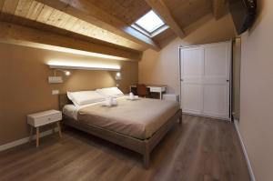 Postel nebo postele na pokoji v ubytování B&b Porta Arpana- Camere & Appartamenti Deluxe in centro