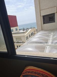 a view from a window of a building at mehdiya plage in Kenitra