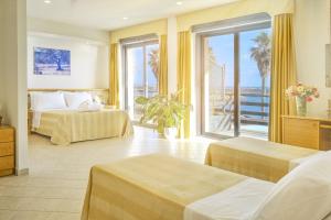 A bed or beds in a room at Hotel Terminal - Caroli Hotels