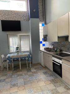 Kuchyňa alebo kuchynka v ubytovaní Urban Loft