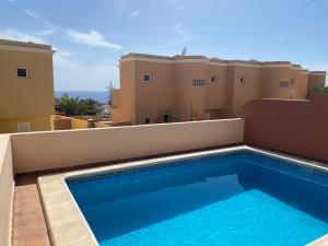 Bazén v ubytovaní Casa Mariben, Vacation Rental home Vv 3 Bedrooms private pool with sea views alebo v jeho blízkosti