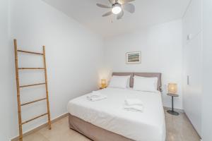 Posteľ alebo postele v izbe v ubytovaní Greek Beach House Complex B1