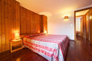 Postel nebo postele na pokoji v ubytování Hotel Dolonne