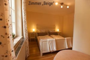 Letto o letti in una camera di Waldgasthaus Balsamine