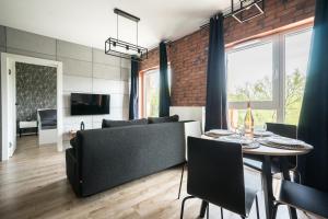 Μια τηλεόραση ή/και κέντρο ψυχαγωγίας στο Grand Lux apartment Grodzienska Near to theOldTown