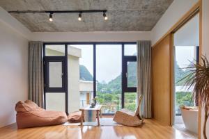 Posedenie v ubytovaní Yangshuo Serene Cove Hotel