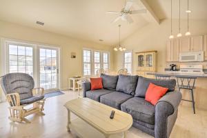 a living room with a couch and a table at Ocean City Family Getaway about Qtr-Mi to Beach! in Ocean City