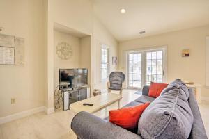 a living room with a couch and a tv at Ocean City Family Getaway about Qtr-Mi to Beach! in Ocean City