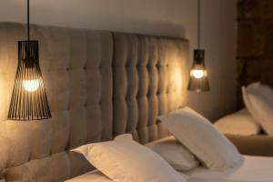 Кровать или кровати в номере Habitaciones Apartamento B&B Plaza Nueva 8