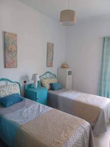 Postel nebo postele na pokoji v ubytování Summer Marsalforn Holiday Apartment + 3 fotografie