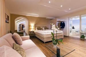 Ένα ή περισσότερα κρεβάτια σε δωμάτιο στο Hotel Amaris