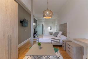Кровать или кровати в номере Habitaciones Apartamento B&B Plaza Nueva 8