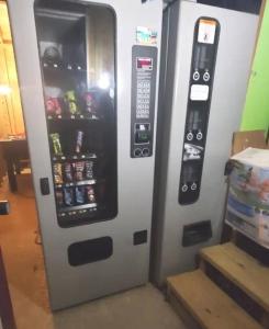 a vending machine with a bunch of drinks in it at Wildwood Camper De Sleeps 6-7, in Dover