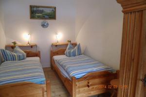 Ένα ή περισσότερα κρεβάτια σε δωμάτιο στο Erika's Haus in der Sonne