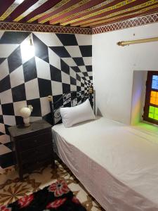 Cama o camas de una habitación en Dar El Amane Abqari